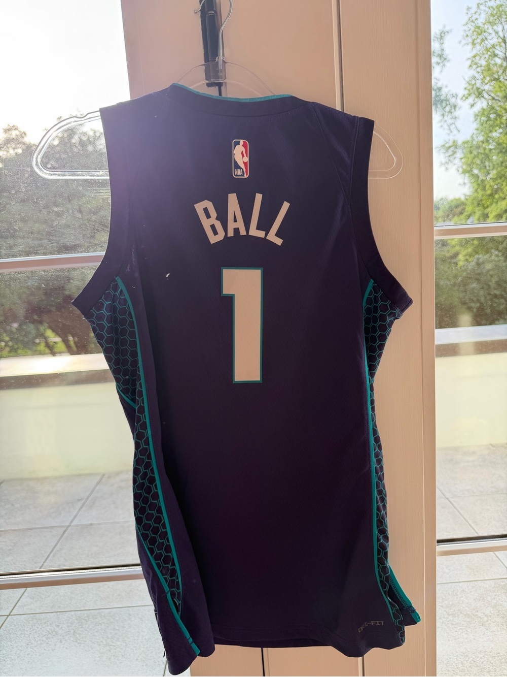 Ball Nike Jordan Navy Basketball Jersey with Teal Trim